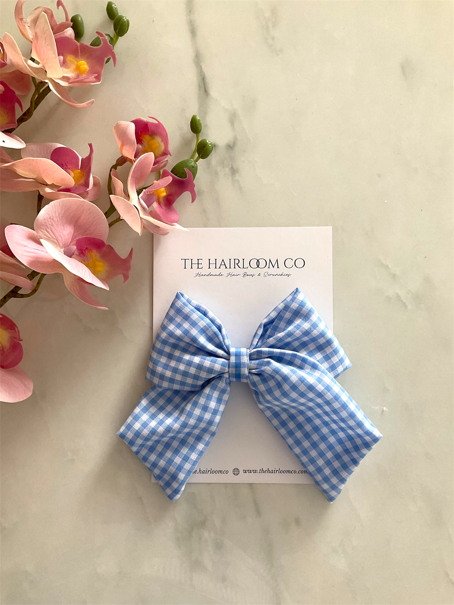 Sky blue gingham sailor hair bow in blue and white check cotton with alligator clip — handmade by The Hairloom Co. Canberra Australia