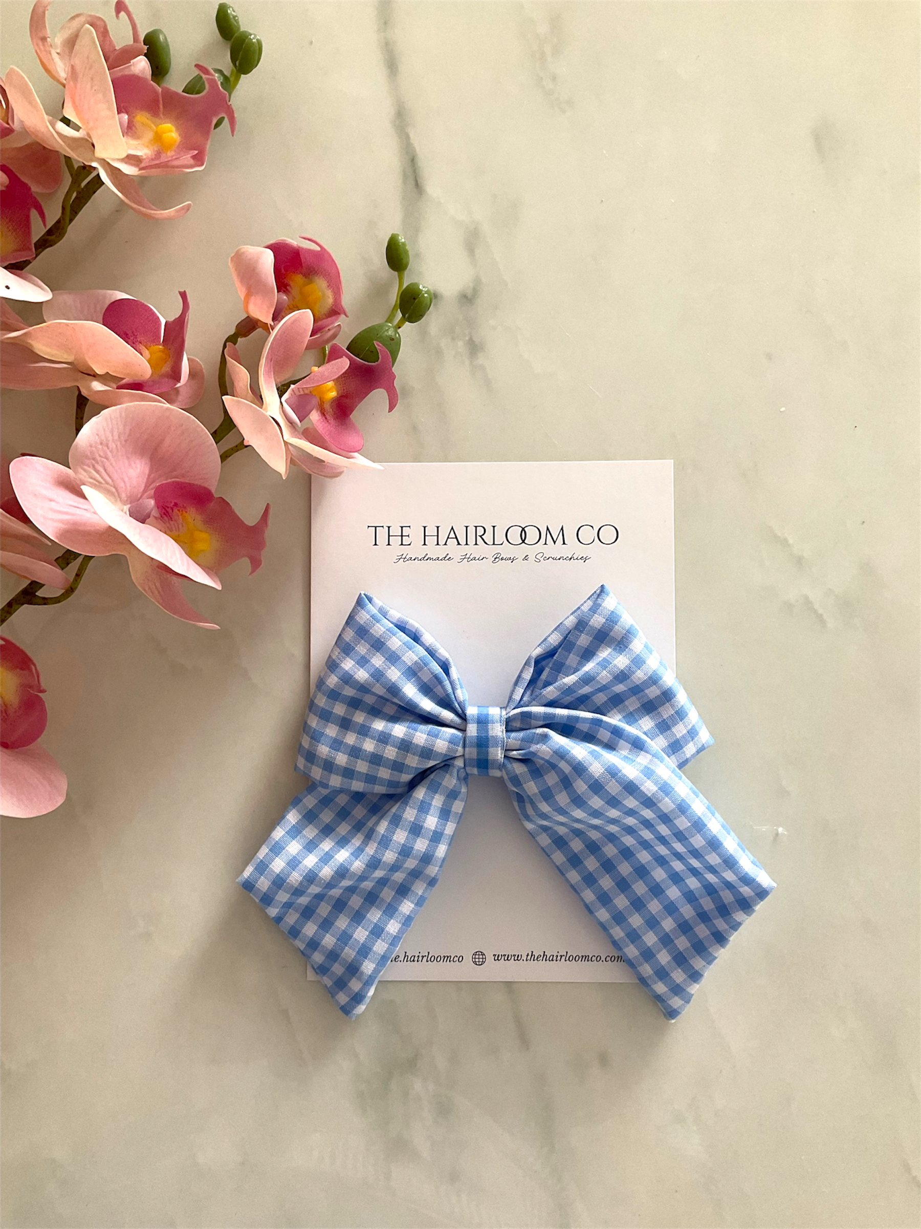 Sky blue gingham sailor hair bow in blue and white check cotton with alligator clip — handmade by The Hairloom Co. Canberra Australia