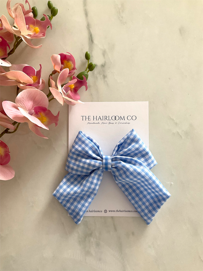 Sky blue gingham sailor hair bow in blue and white check cotton with alligator clip — handmade by The Hairloom Co. Canberra Australia