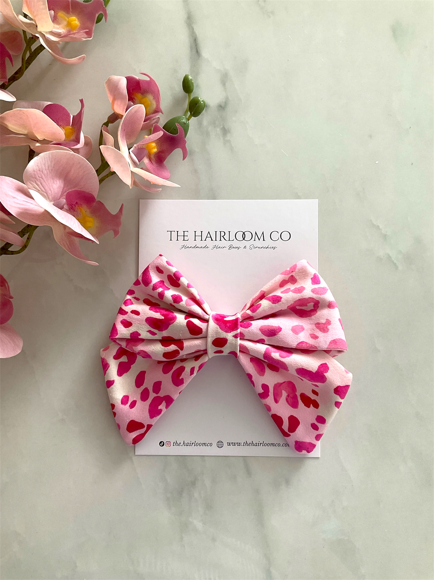 Pink leopard print sailor hair bow in hot pink and blush with alligator clip — handmade by The Hairloom Co. Canberra Australia